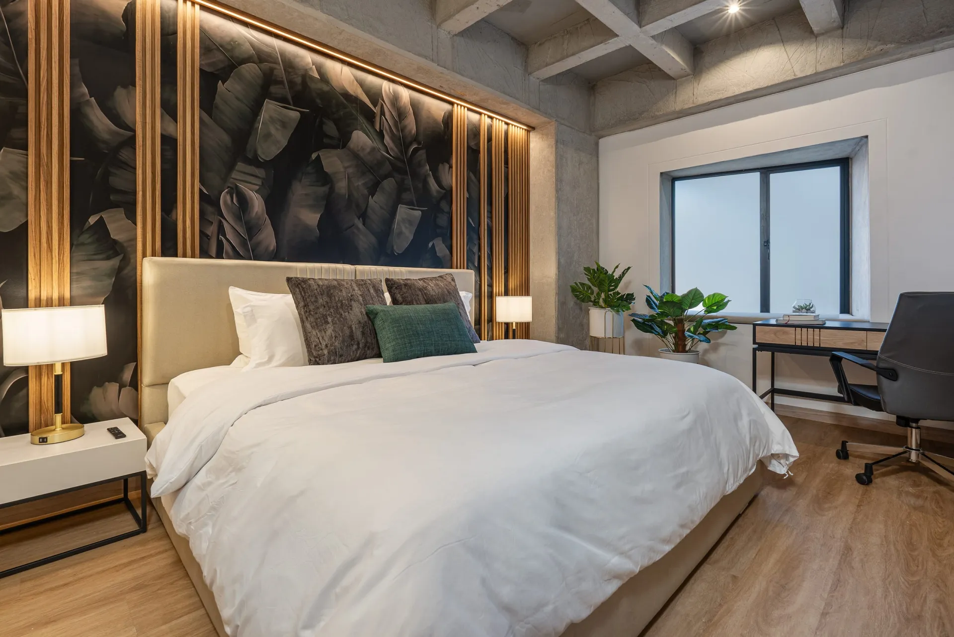 Habitación de un apartamento operado por CAXA en Laureles